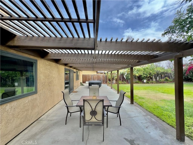 view of patio with outdoor dining area, a fenced backyard, and a pergola