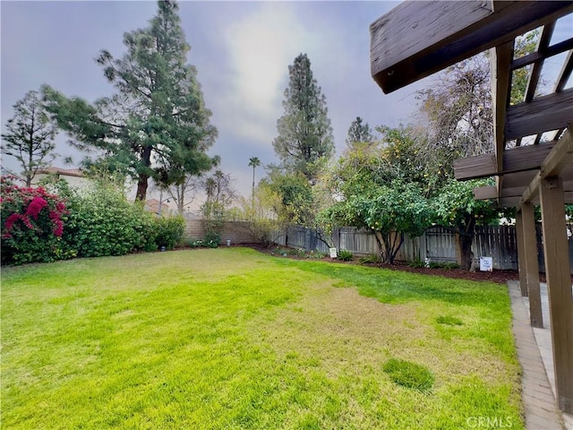 view of yard featuring a fenced backyard