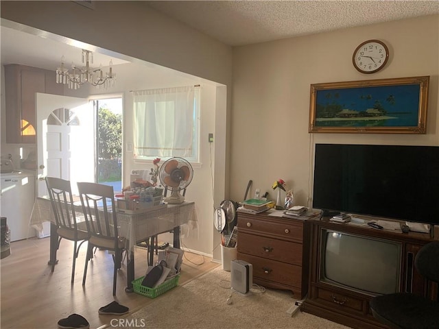 2665 Millet Ave, El Monte, CA 71733 - dining space with a textured ceiling and an inviting chandelier