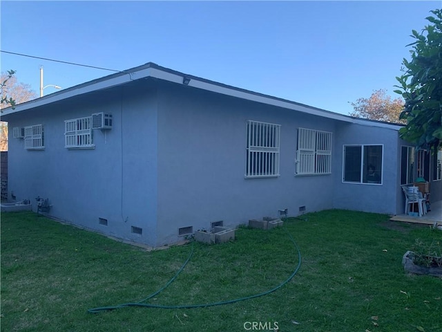 2665 Millet Ave, El Monte, CA 71733 - view of property exterior with crawl space, a lawn, and stucco siding