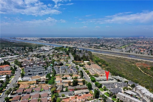 aerial view featuring a residential view and a water view