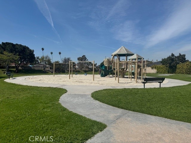 community play area featuring a yard