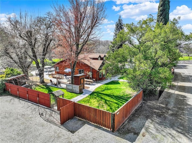 exterior space featuring a gate and fence