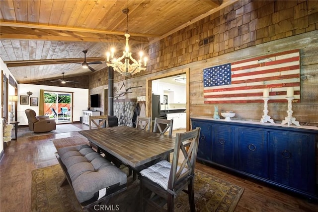24891 Tehama Vina, Los Molinos, CA 96055 - dining area with visible vents, wooden ceiling, wood finished floors, vaulted ceiling with beams, and a wood stove