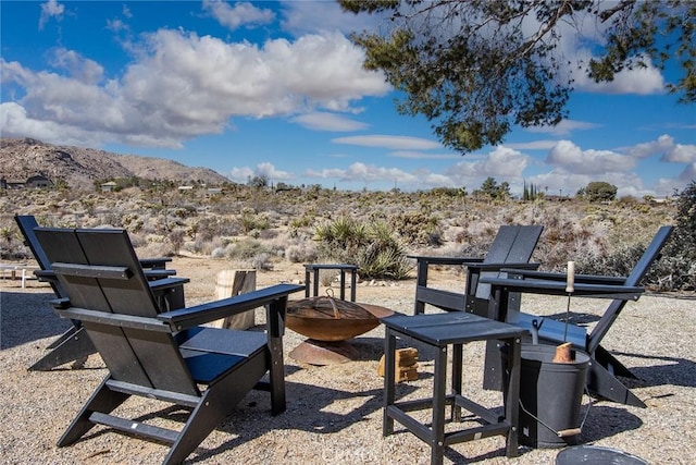 7716 Sunset Rd, Joshua Tree, CA 92252 - exterior space featuring a mountain view and an outdoor fire pit