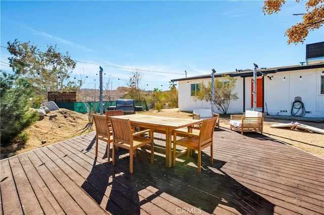 deck featuring outdoor dining space