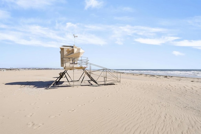 view of water feature with a beach view