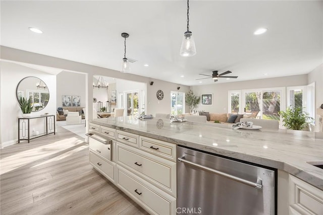 kitchen with light wood-style floors, recessed lighting, open floor plan, and stainless steel dishwasher