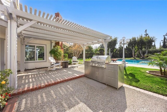 view of patio with an outdoor pool, area for grilling, and a pergola