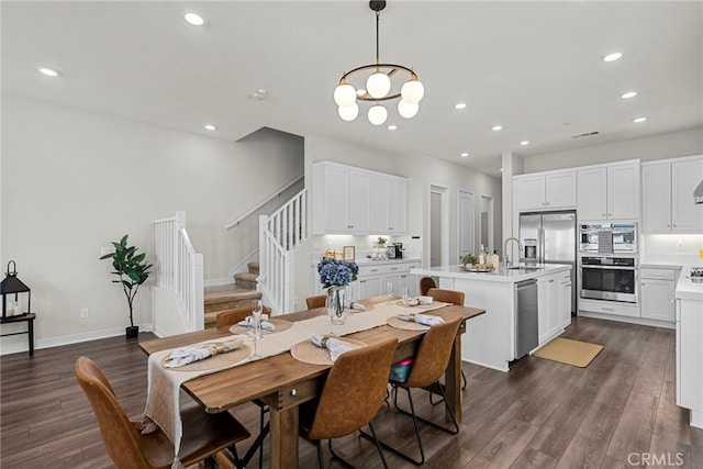 dining area featuring dark wood-style floors, stairway, baseboards, and recessed lighting