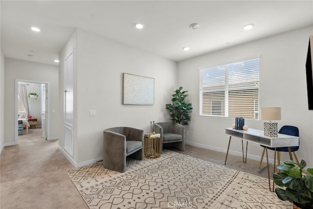 home office featuring baseboards, light carpet, and recessed lighting