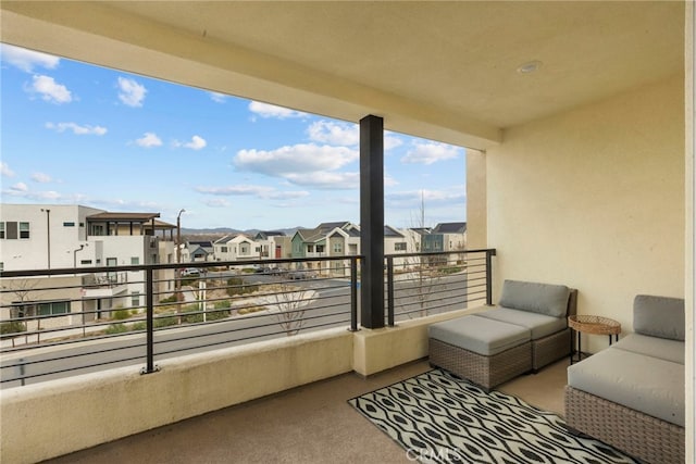 balcony featuring a residential view