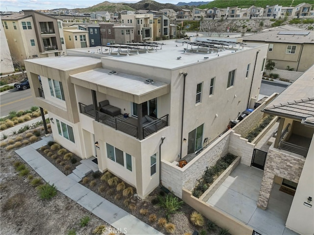 view of property with a residential view and a mountain view