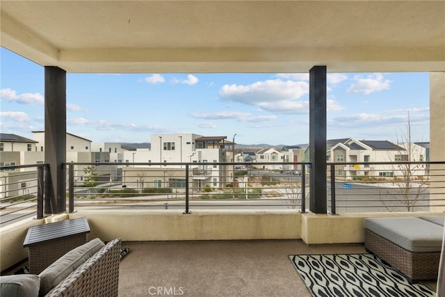 balcony featuring a residential view