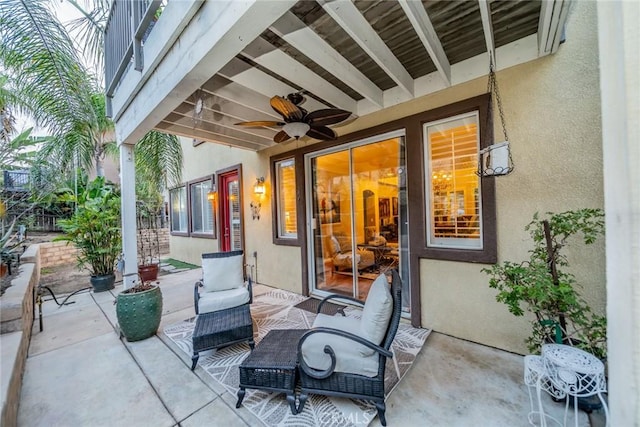 view of patio / terrace featuring ceiling fan