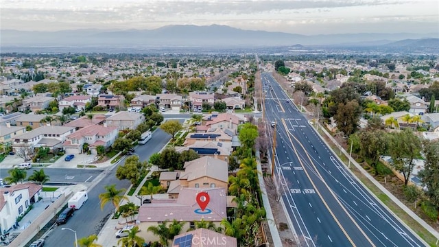 drone / aerial view with a mountain view and a residential view