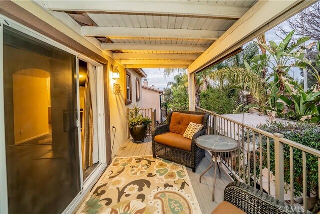 balcony featuring a sunroom