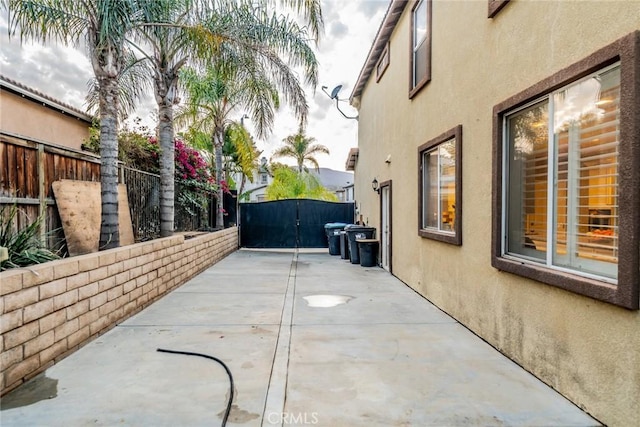 view of patio / terrace with a gate and fence