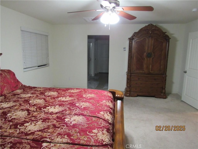 carpeted bedroom with a ceiling fan