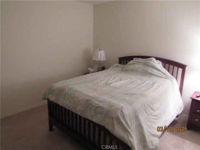 bedroom with baseboards