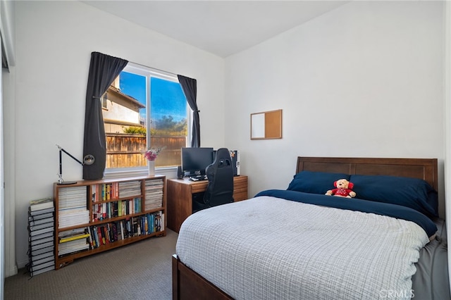 bedroom featuring carpet