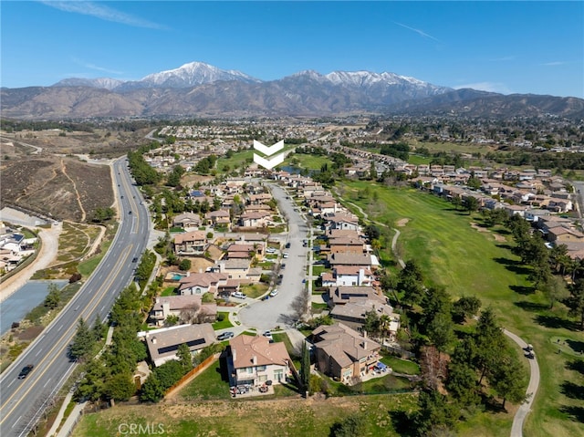 drone / aerial view with a residential view and a mountain view