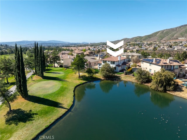 birds eye view of property featuring a residential view and a water and mountain view