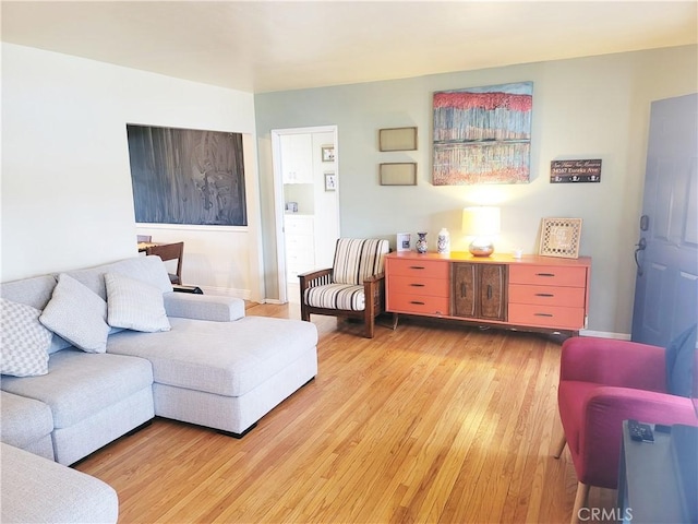 living area with light wood finished floors