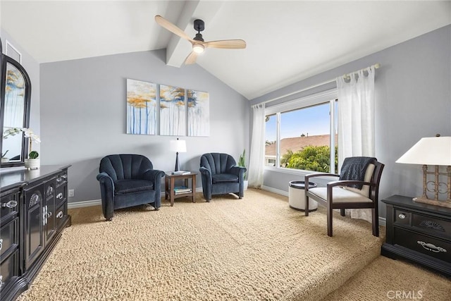 sitting room featuring light carpet, vaulted ceiling, baseboards, and ceiling fan