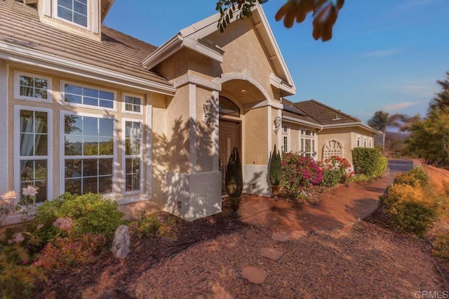 exterior space with stucco siding