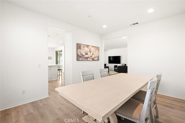 office with recessed lighting, baseboards, visible vents, and light wood finished floors