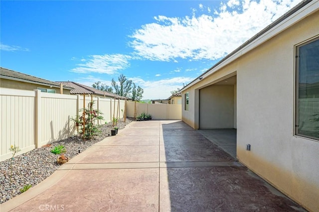 view of patio with a fenced backyard