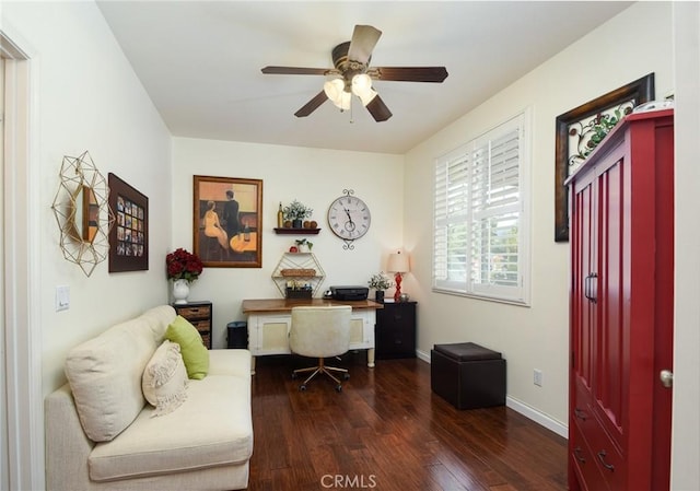 office with a ceiling fan, baseboards, and wood finished floors