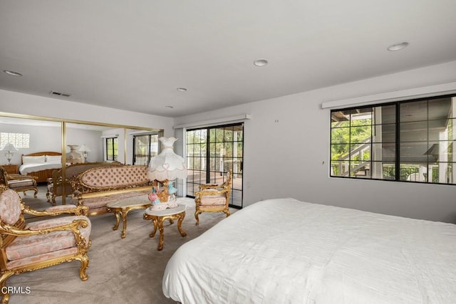 bedroom featuring carpet, multiple windows, visible vents, and recessed lighting