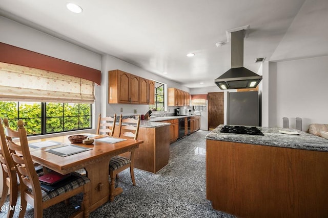 kitchen with black dishwasher, brown cabinets, freestanding refrigerator, island exhaust hood, and recessed lighting