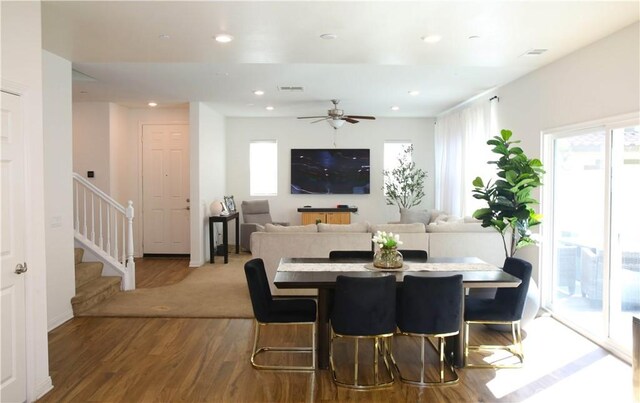 27464 Honeydew Ct, Saugus, CA 91350 - dining room with wood finished floors, recessed lighting, stairway, and a ceiling fan