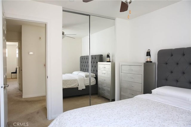 27464 Honeydew Ct, Saugus, CA 91350 - bedroom featuring light colored carpet, a closet, ceiling fan, and baseboards