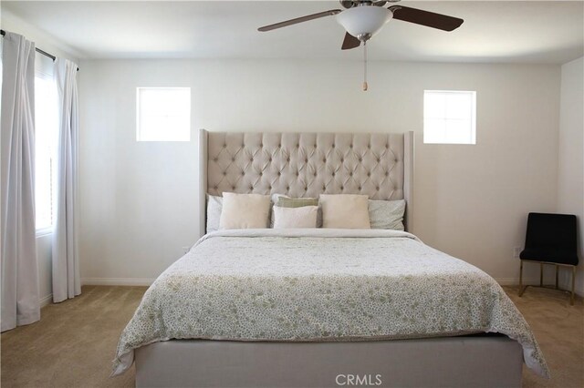 27464 Honeydew Ct, Saugus, CA 91350 - bedroom with carpet flooring, baseboards, and a ceiling fan