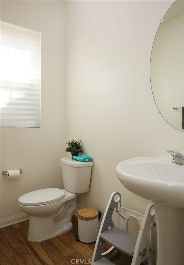 27464 Honeydew Ct, Saugus, CA 91350 - half bath featuring toilet and wood finished floors