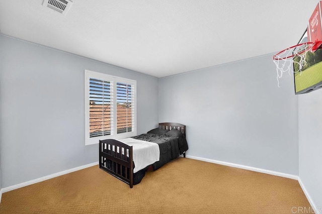 bedroom featuring carpet, visible vents, and baseboards