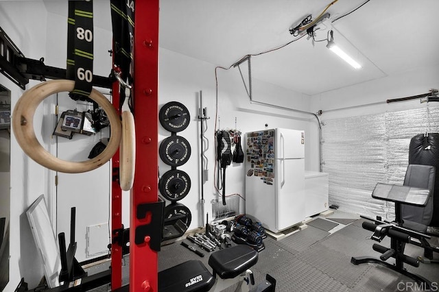 exercise room featuring a garage