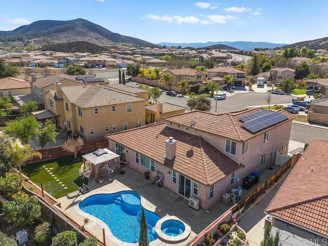 aerial view with a residential view and a mountain view