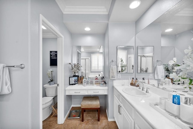 full bath featuring tile patterned flooring, toilet, vanity, a stall shower, and crown molding