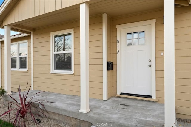 812 Toomes Ave, Corning, CA 96021 - property entrance with a porch