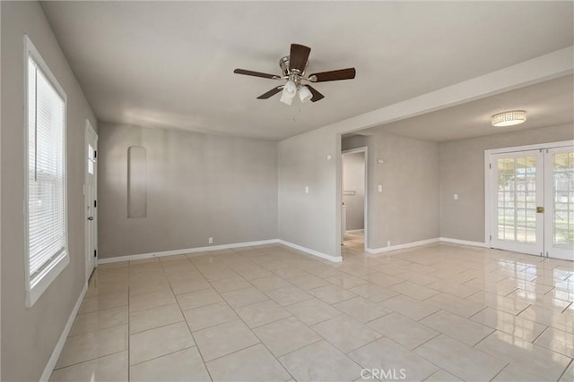 812 Toomes Ave, Corning, CA 96021 - spare room featuring light tile patterned floors, french doors, baseboards, and ceiling fan