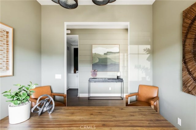sitting room featuring wood finished floors