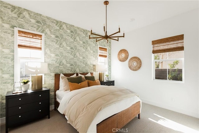 carpeted bedroom with baseboards