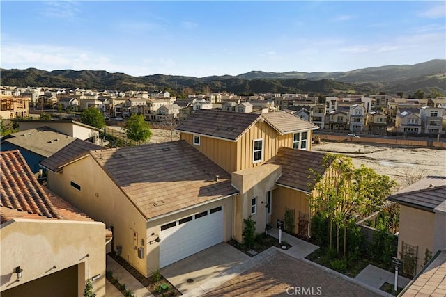 aerial view with a residential view and a mountain view