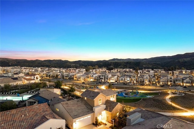 aerial view with a residential view and a mountain view