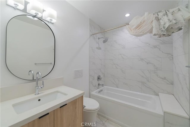 full bathroom with marble finish floor, recessed lighting, bathtub / shower combination, toilet, and vanity